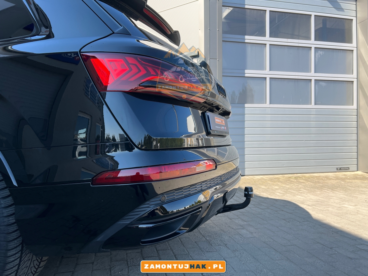 zdjecie haka 305437600001 po montazu w samochodzie audi q7 montaz hakow w poznaniu zdjecia z warsztatu na tle firmy